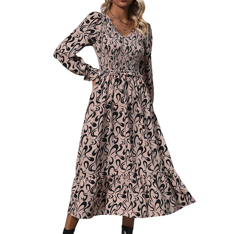 Abstract Print Dress with V-Neck and Smocked Bodice