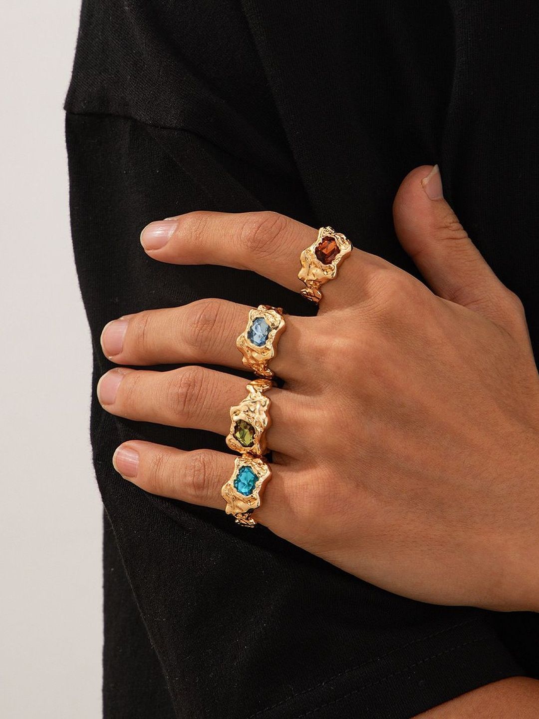 Men Set Of 4 Gold-Plated Stone-Studded Finger Ring