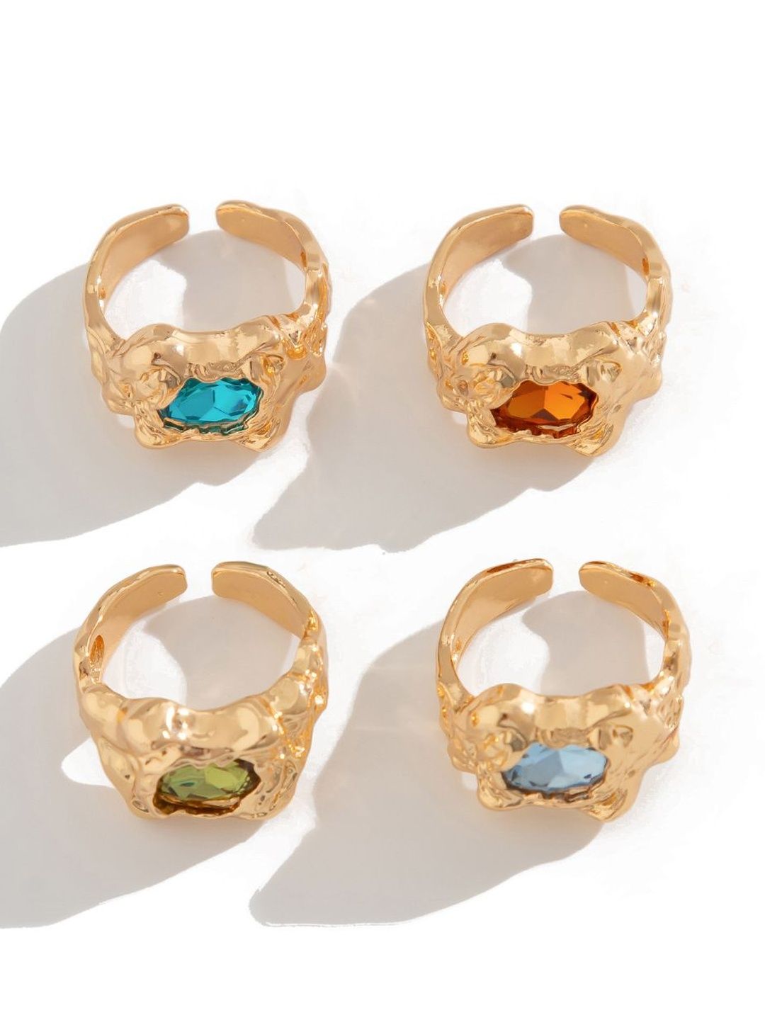 Men Set Of 4 Gold-Plated Stone-Studded Finger Ring