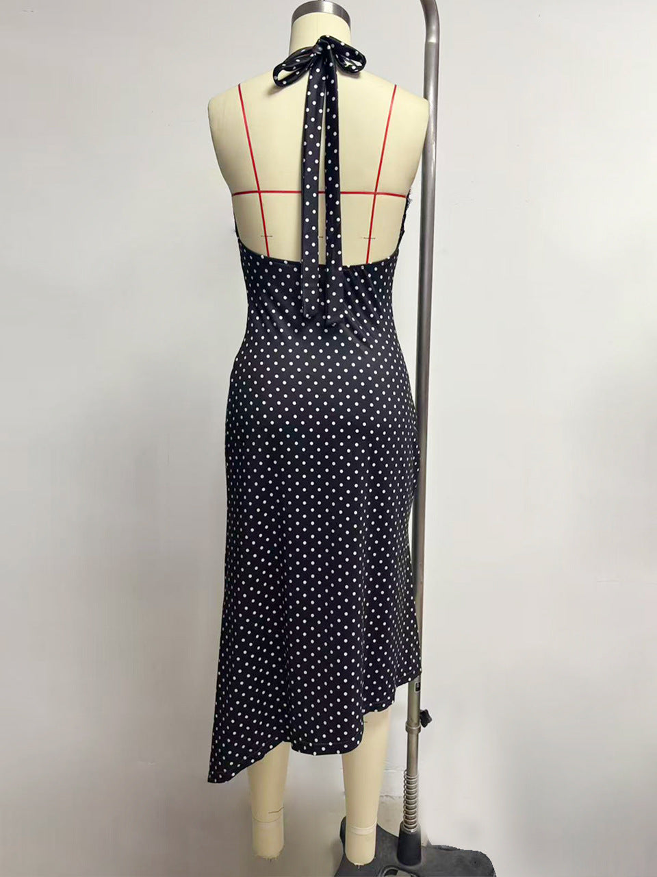 Polka Dot Halter Midi Dress with Lace Trim and Asymmetrical Hem