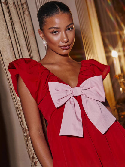 V-Neck Mini Dress with Ruffle Sleeves and Oversized Bow