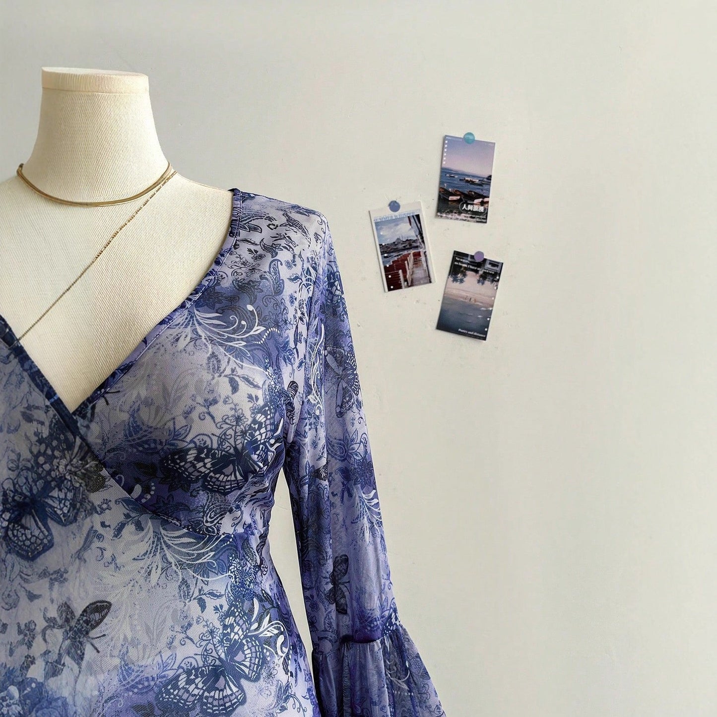 Butterfly Print V-Neck Top with Bell Sleeves and Asymmetric Hem
