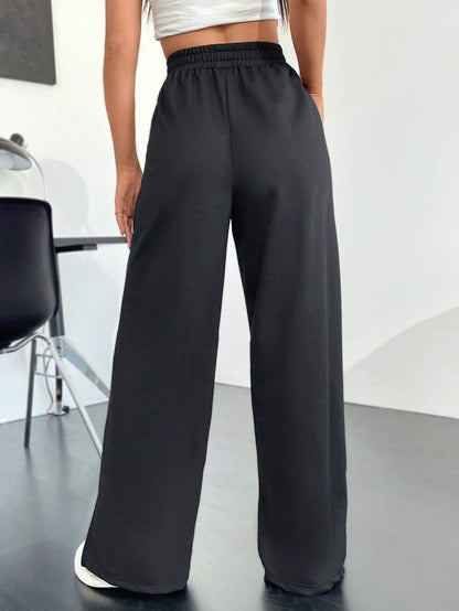 Wide-Leg Cotton Blend Trousers with High Waist and Split Hem