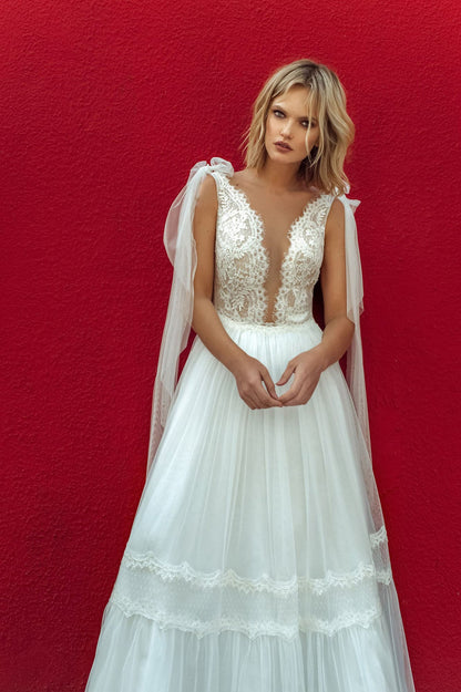 Flowy Tiered Maxi Dress with Deep V-Neck and Lace Bodice