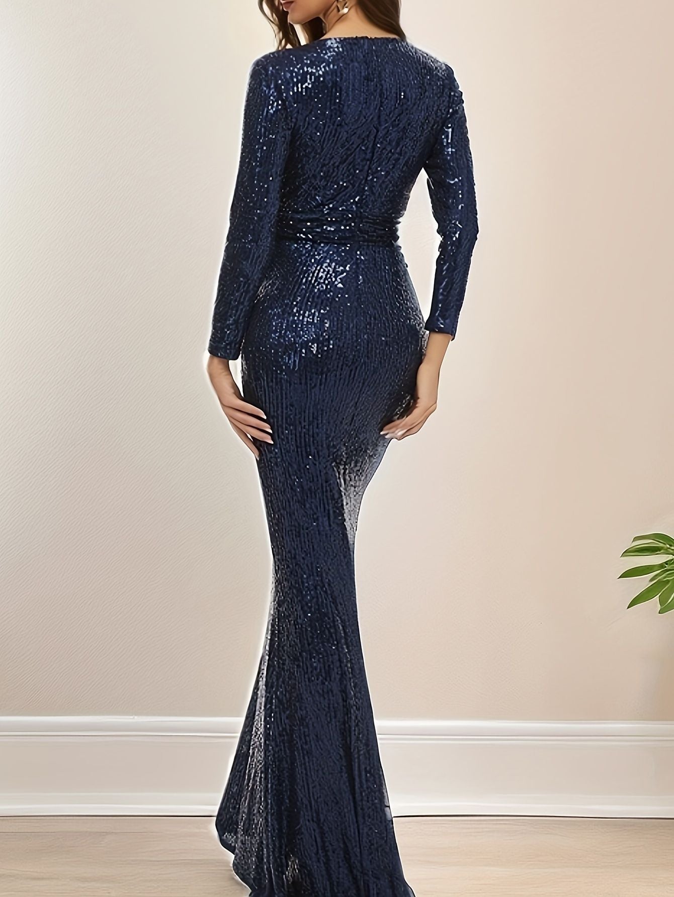 Sequined Mermaid Gown with Deep V-Neck and Long Sleeves