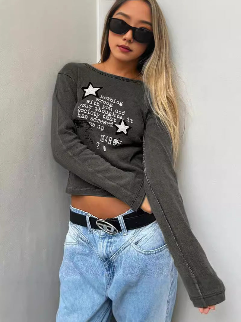 Distressed Cropped Long-Sleeved Top with Graphic Print