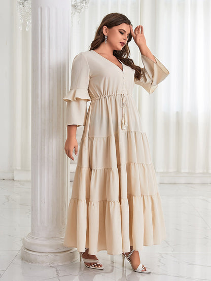 Solid Maxi Dress with V-Neck, Tiered Skirt, and Bell Sleeves