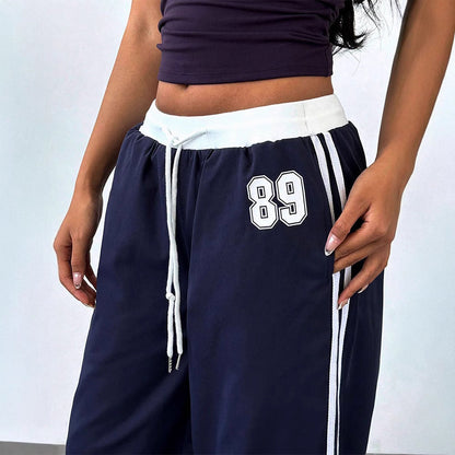 Wide-Leg Track Pants with High Waist and Side Stripes