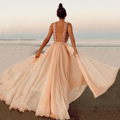 Flowy Maxi Dress with High Waist and Embellished Detail