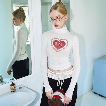 Slim Cropped Long Sleeve Turtleneck Top with Heart Print