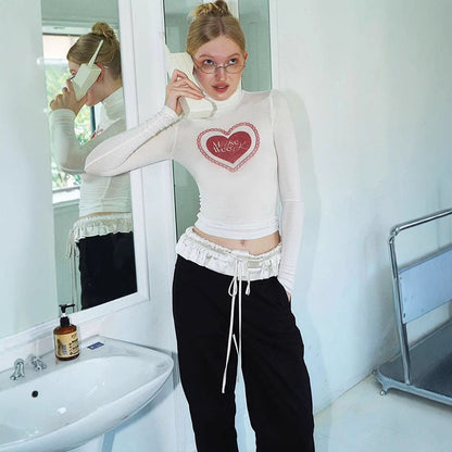 Slim Cropped Long Sleeve Turtleneck Top with Heart Print