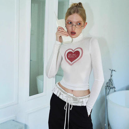 Slim Cropped Long Sleeve Turtleneck Top with Heart Print