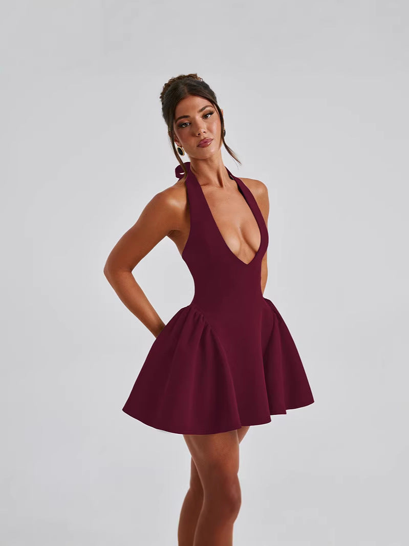 Backless Halter Mini Dress with Deep V-Neck and Pleated Skirt