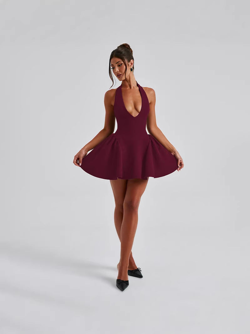 Backless Halter Mini Dress with Deep V-Neck and Pleated Skirt