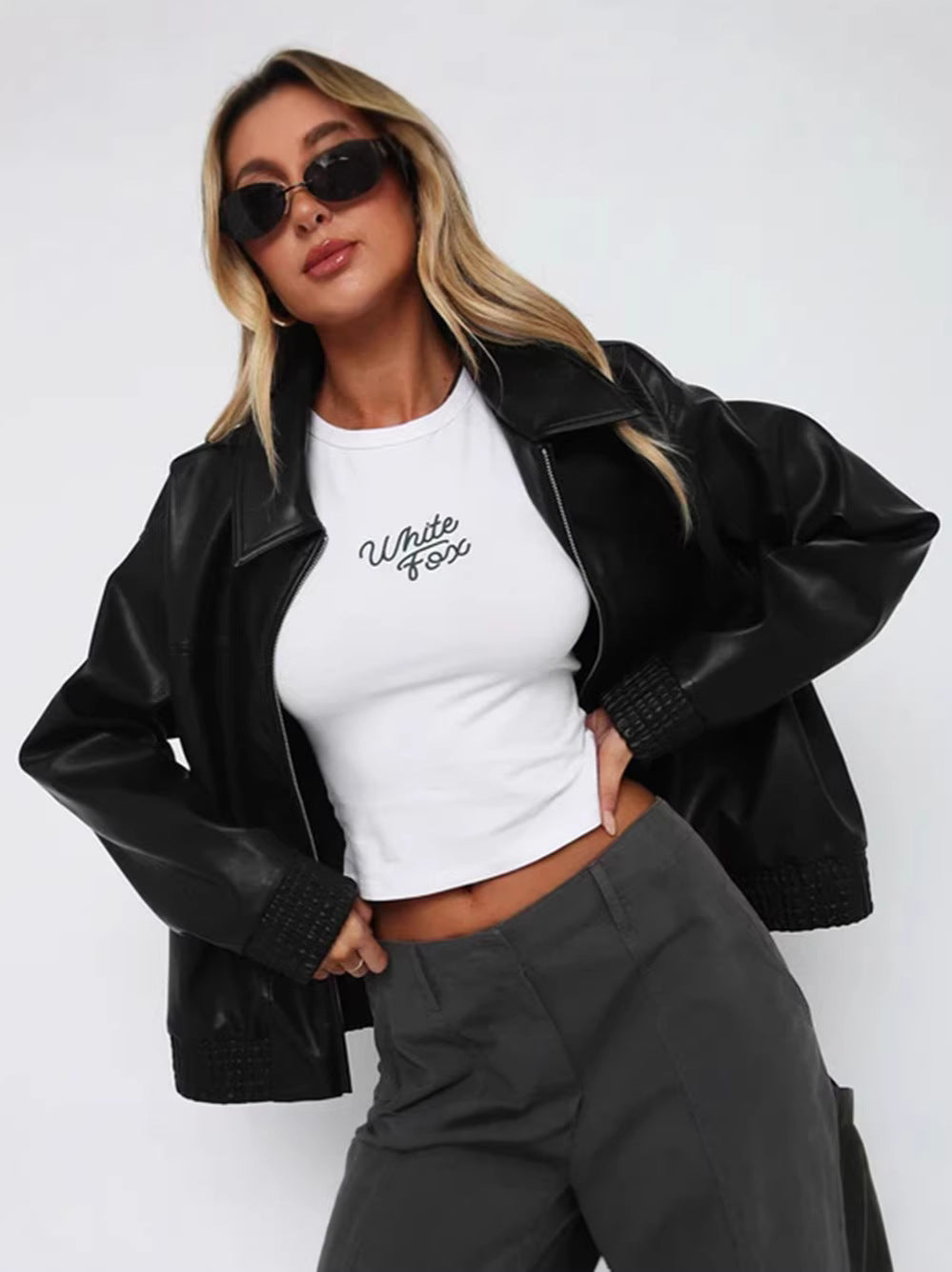Oversized Faux Leather Jacket with Lapel and Quilted Trim
