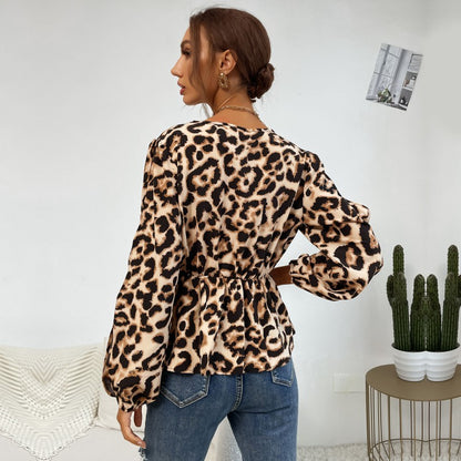 Leopard Print Peplum Top with V-Neck and Cut-Out Sleeves