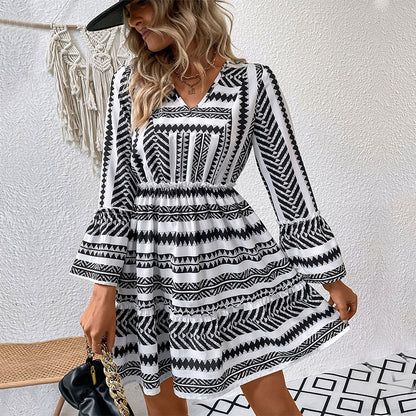 Black and White Geometric Print Mini Dress with V-Neck and Flared Sleeves