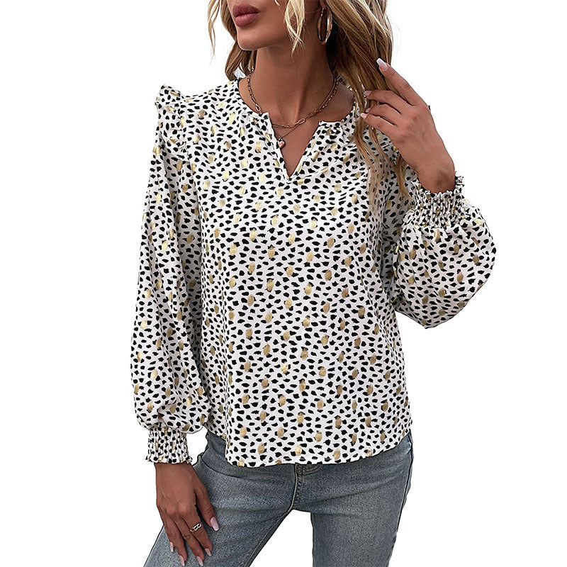Speckled Blouse with V-Neck and Ruffle Shoulders