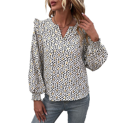 Speckled Blouse with V-Neck and Ruffle Shoulders
