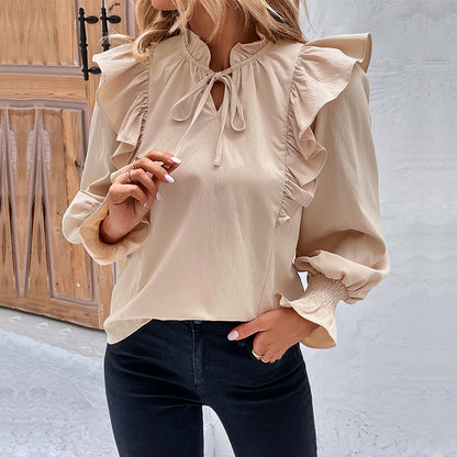 Solid Ruffled Blouse with Tie-Neck and Smocked Cuffs