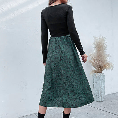 Color-Blocked Midi Dress with V-Neck and Printed Skirt