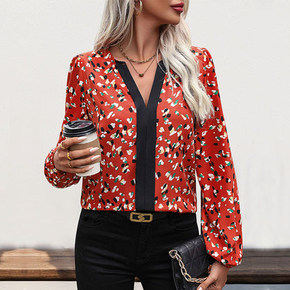 Abstract Print Blouse with Long Sleeves and Contrast V-Neck