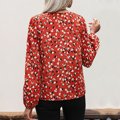 Abstract Print Blouse with Long Sleeves and Contrast V-Neck