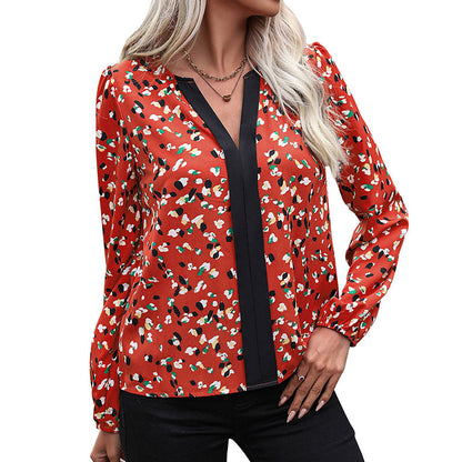 Abstract Print Blouse with Long Sleeves and Contrast V-Neck