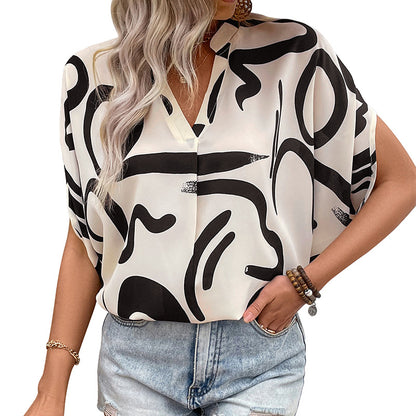 Abstract Print Blouse with V-Neck and Bat Sleeves