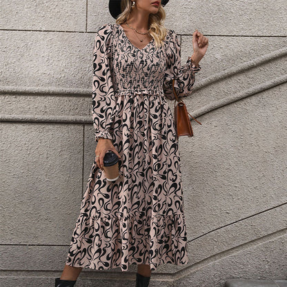 Abstract Print Dress with V-Neck and Smocked Bodice
