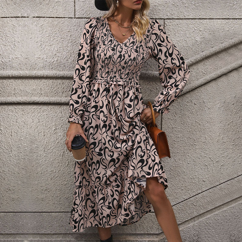 Abstract Print Dress with V-Neck and Smocked Bodice