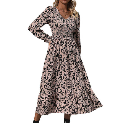 Abstract Print Dress with V-Neck and Smocked Bodice
