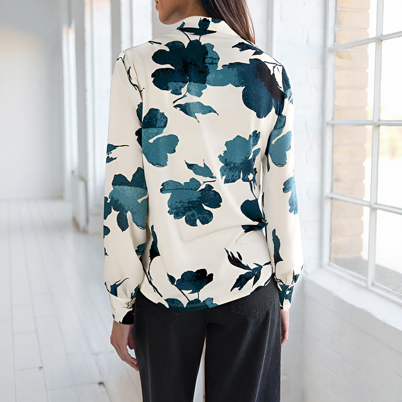 Artistic Floral Print Blouse with V-Neck and Lantern Sleeves