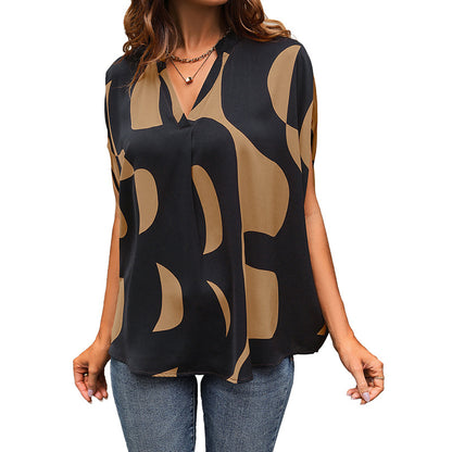 Abstract Print Blouse with V-Neck and Dolman Sleeves