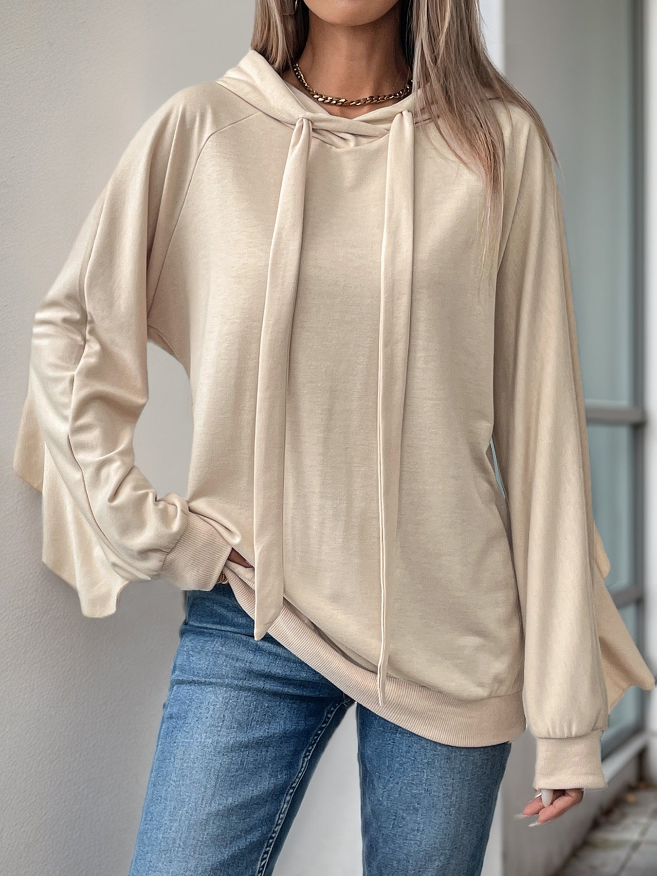 Oversized Solid Sweatshirt with Drawstring Hood and Bell Sleeves