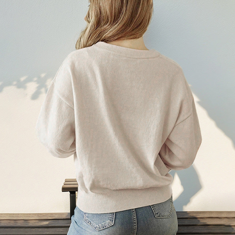 Solid Crew Neck Sweater with Loose Fit and Ribbed Hem