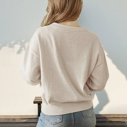 Solid Crew Neck Sweater with Loose Fit and Ribbed Hem