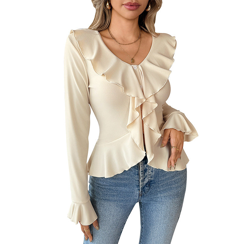 Long Sleeve Peplum Blouse with Ruffled Front and Flared Cuffs