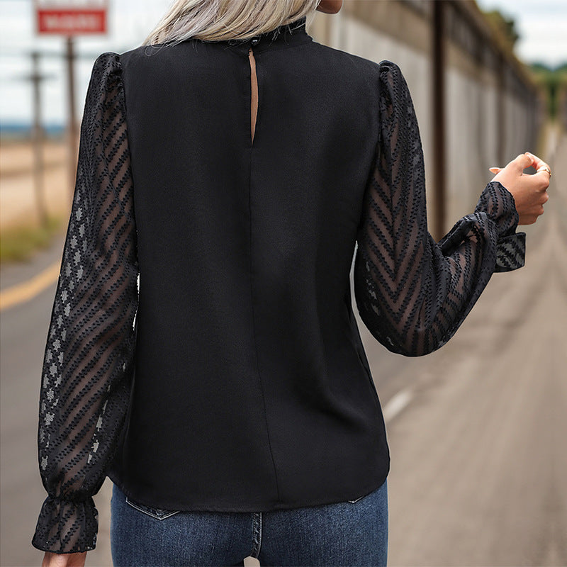 Solid Blouse with Sheer Chevron Puff Sleeves and Ruffled Mock Neck