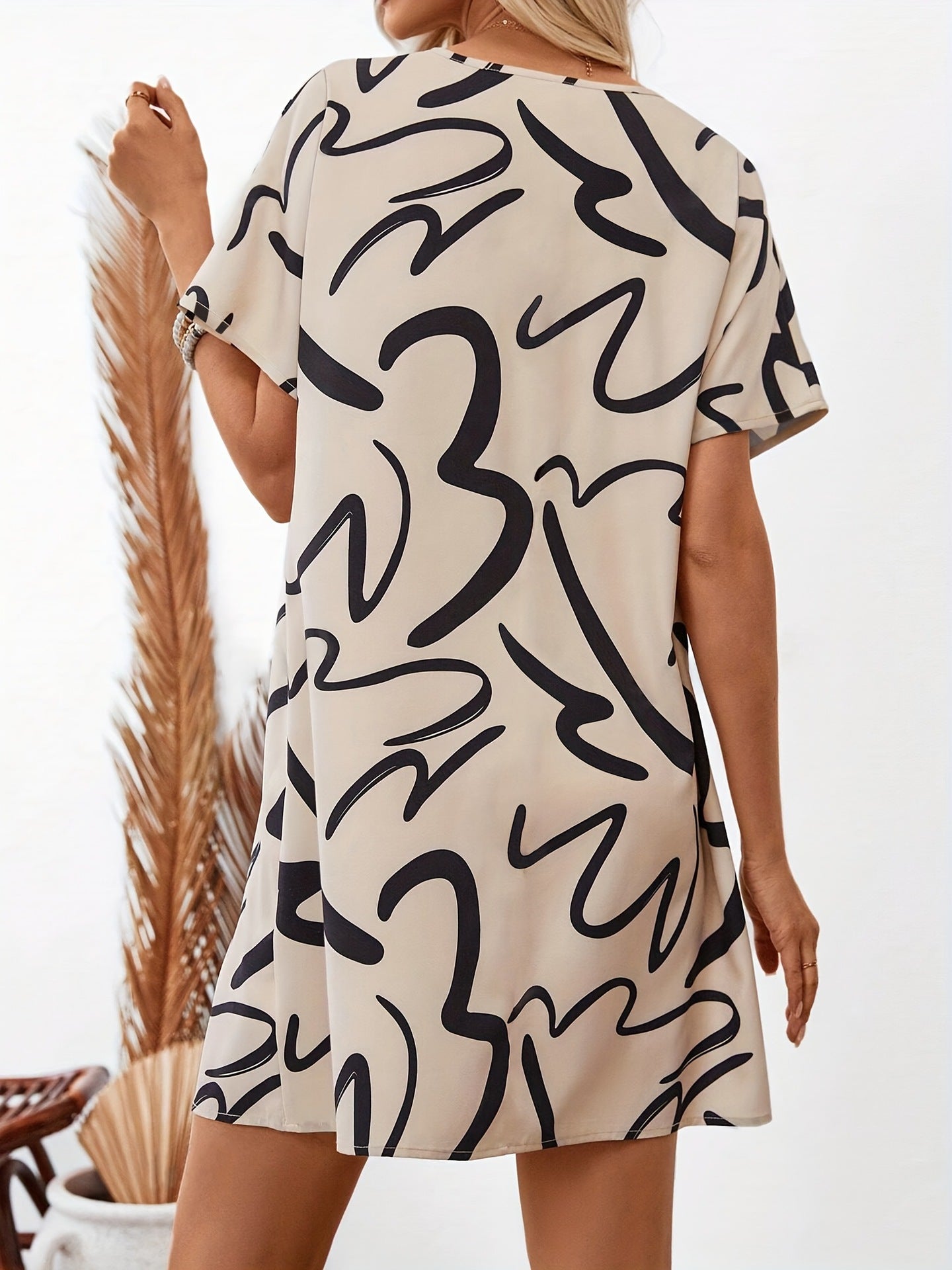 Loose Abstract Print Mini Dress with Tie-Neck