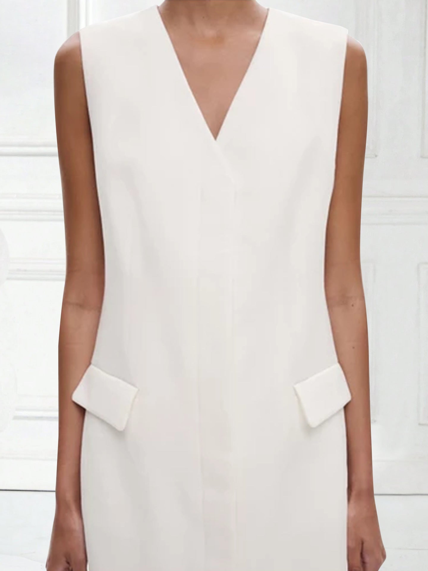 Sleeveless Shift Mini Dress with V-Neck and Flap Pockets