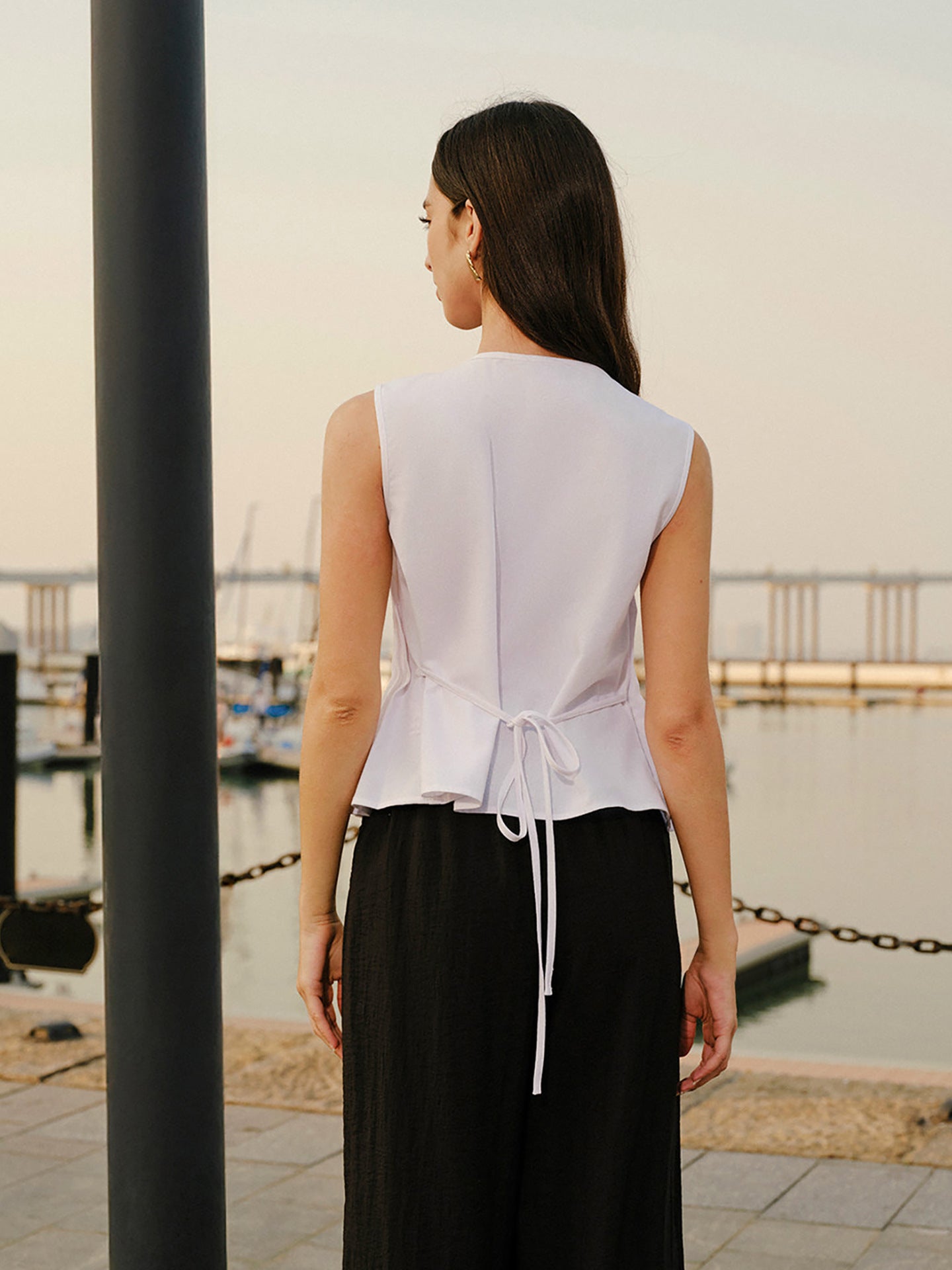 Pleated Peplum Vest with Tie-Back Detail