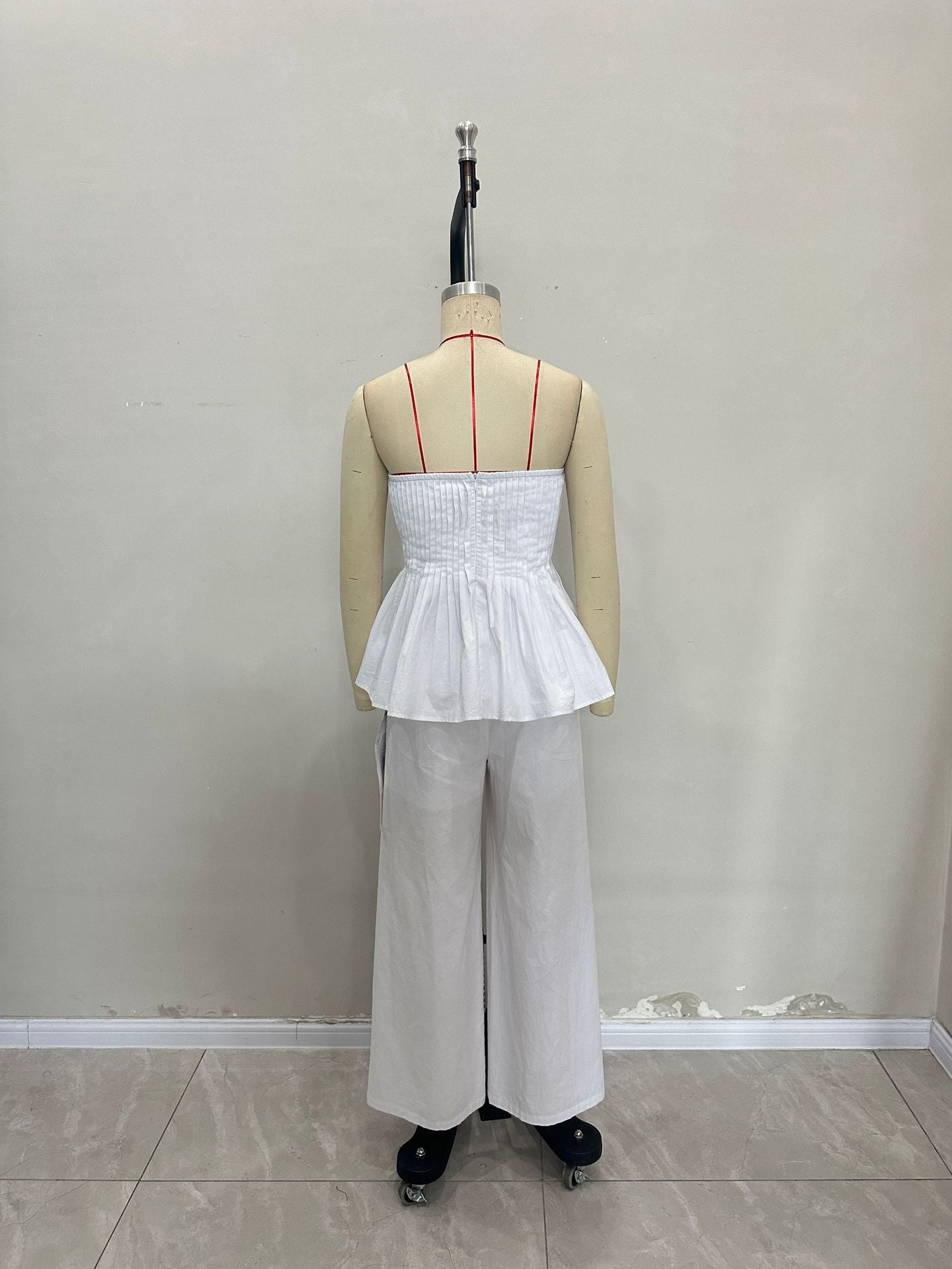 Strapless Pleated Peplum Top and Wide-Leg Trousers Suit