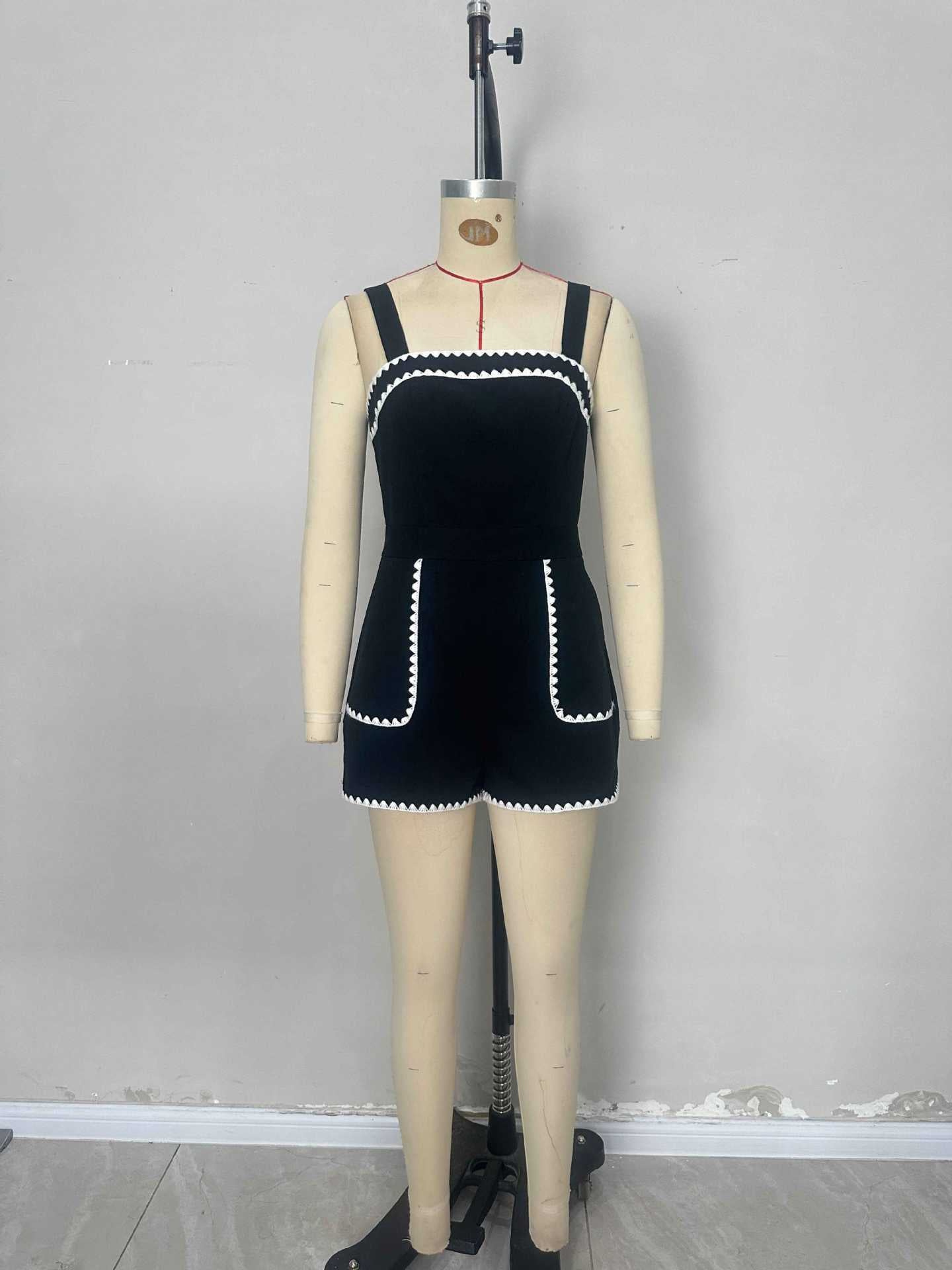 Black Romper with White Scalloped Trim and Pockets