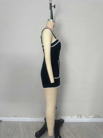 Black Romper with White Scalloped Trim and Pockets