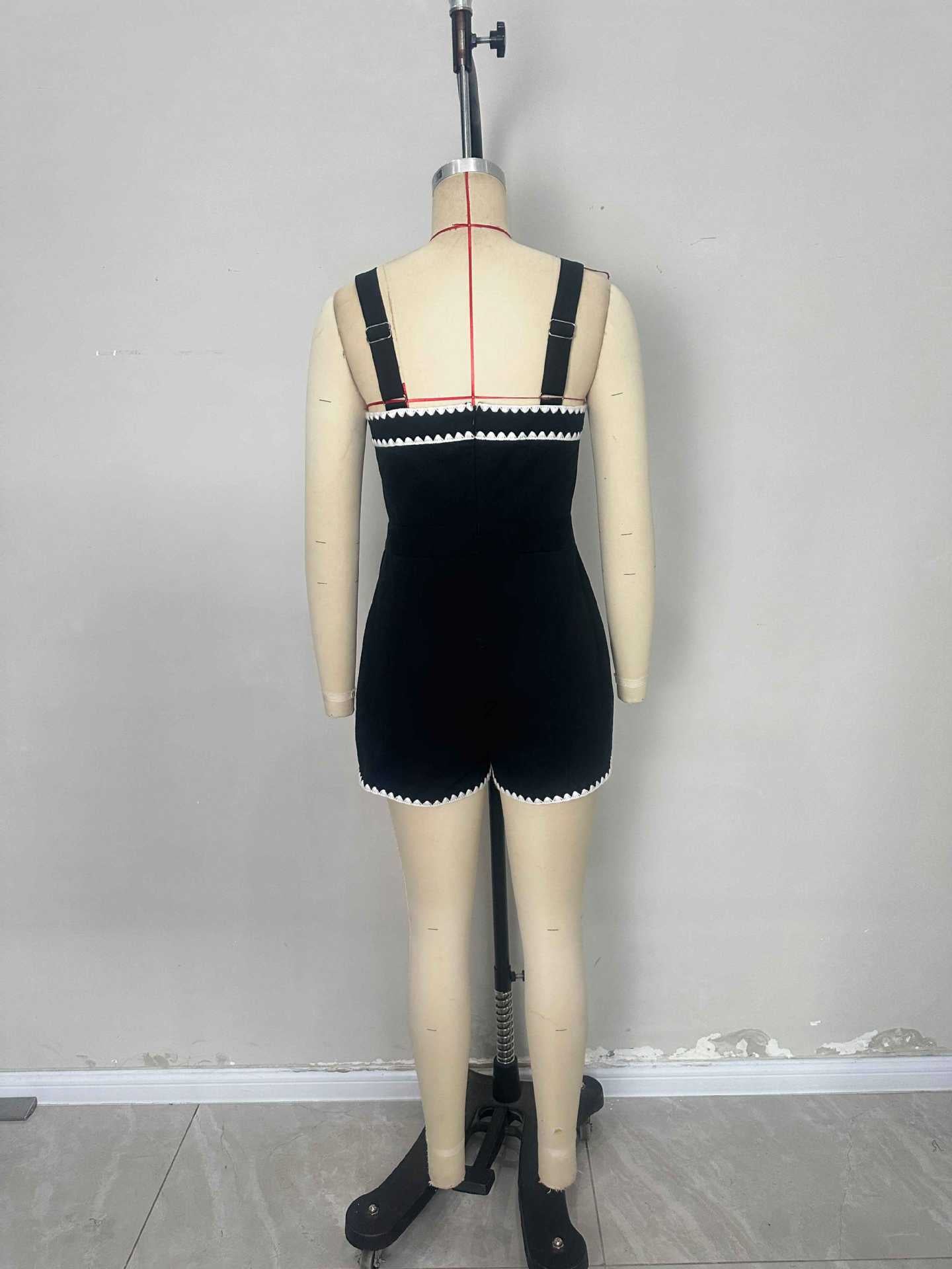 Black Romper with White Scalloped Trim and Pockets