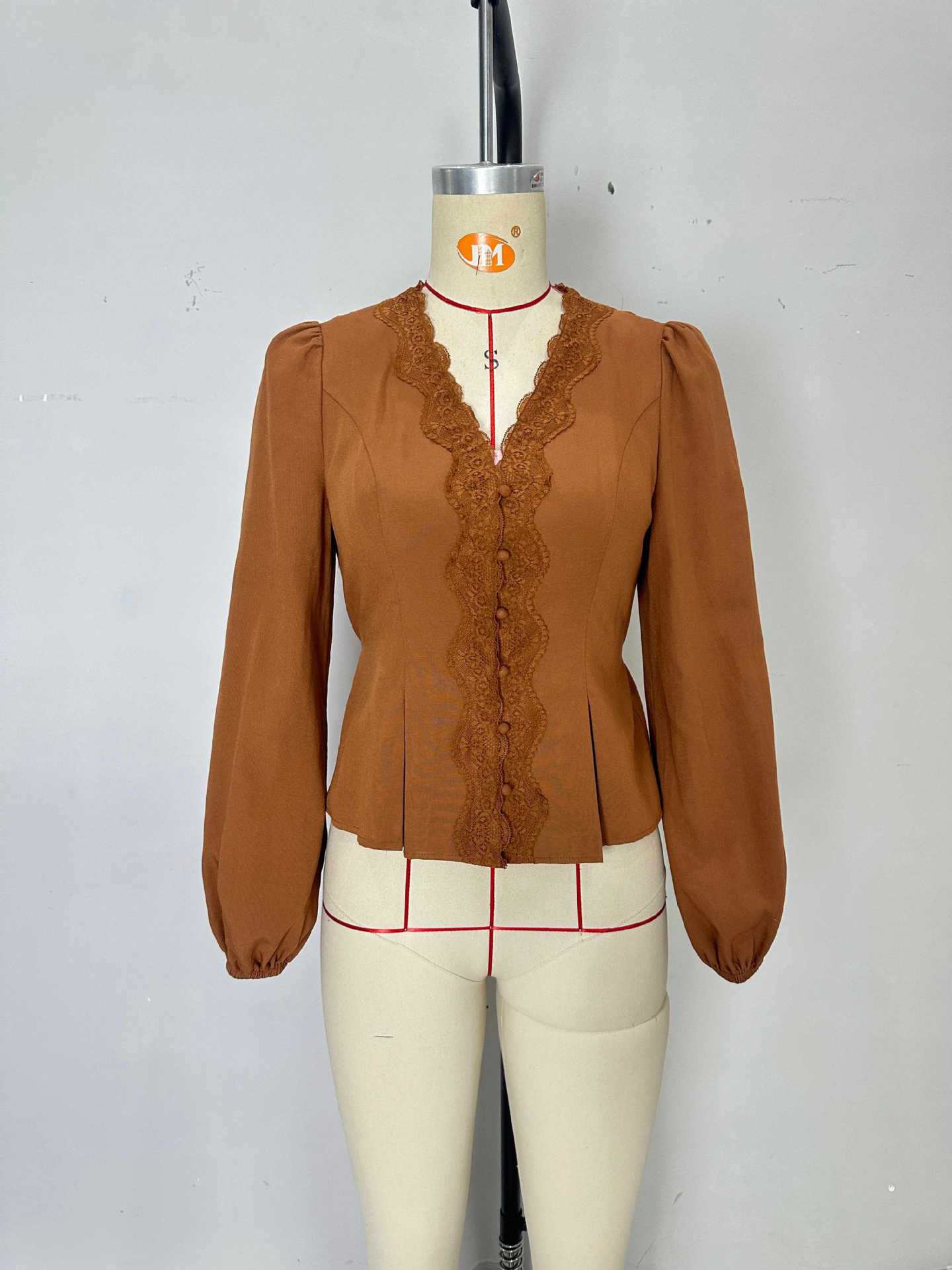 Peplum Blouse with Lace Trim V-Neck and Tie-Back