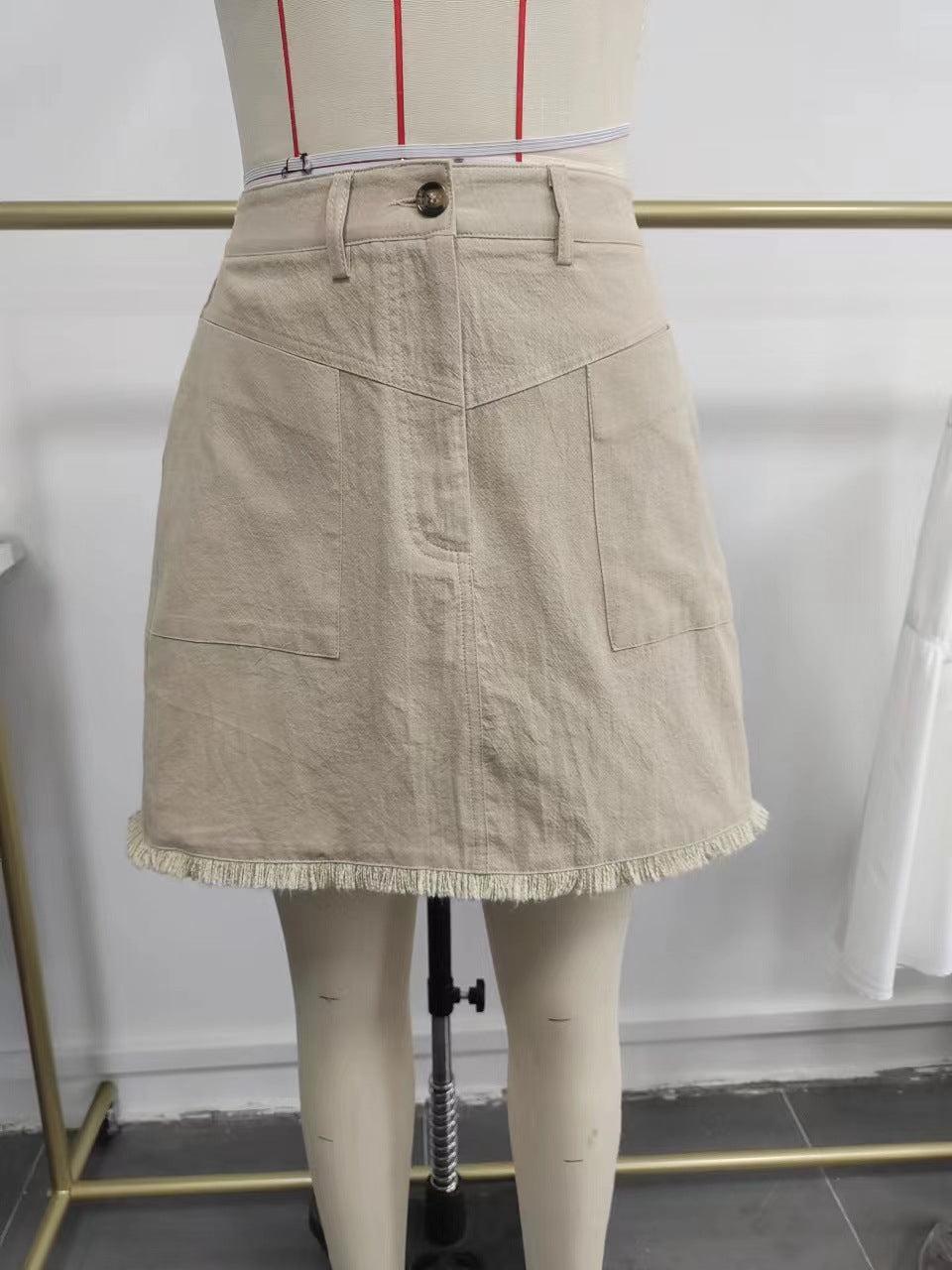 High-Waist Bodycon Mini Skirt with Fringed Hem & Patch Pockets