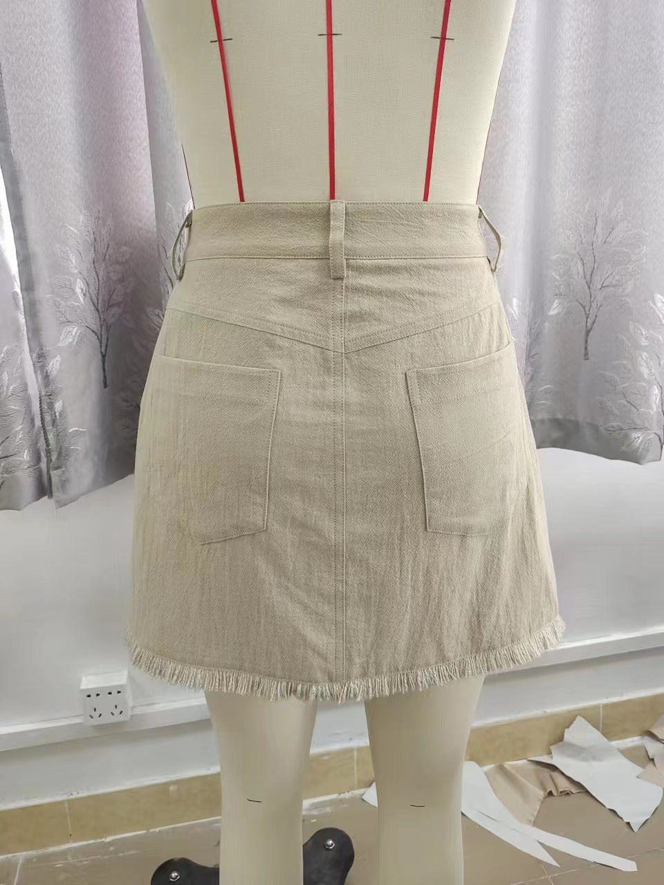 High-Waist Bodycon Mini Skirt with Fringed Hem & Patch Pockets