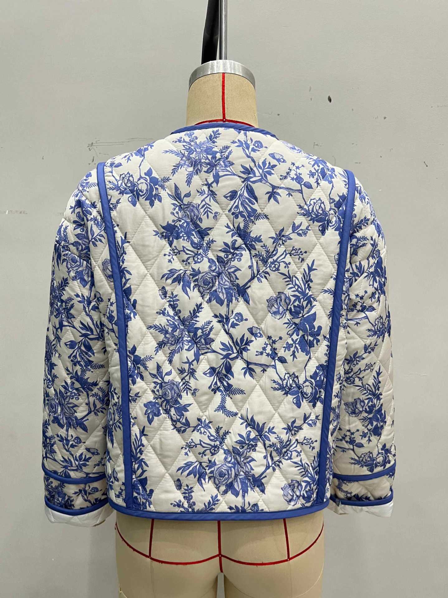 Blue Floral Quilted Jacket with Collarless V-Neck